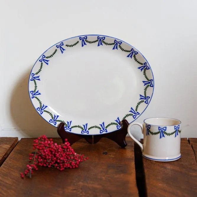 Elegant Oval Platter with Swags and Bows Design